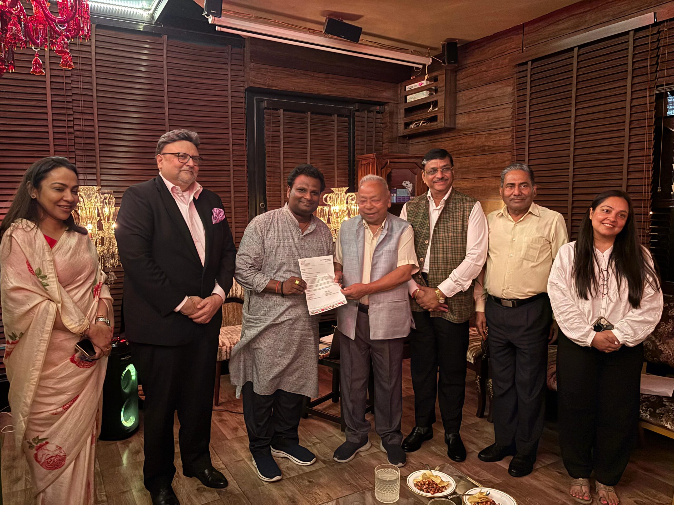 Felicitation by Mr. Harvannsh Chawla
